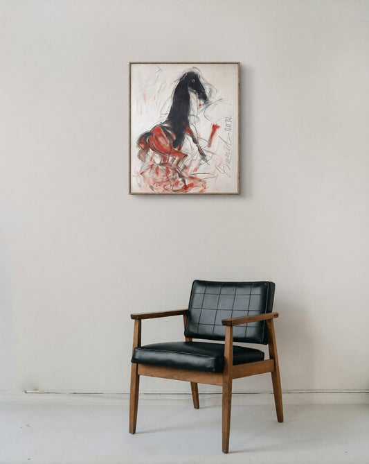 Original horse painting by Indian artist Sunil Das, featuring an expressive black horse with bold red brushstrokes, displayed on a minimal white wall above a wooden and black leather chair.